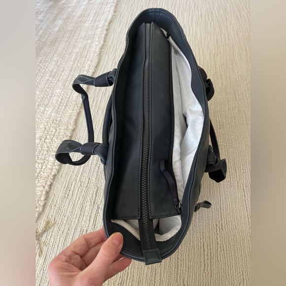 Lululemon gym bag. EUC. Loads of pockets. Very sturdy construction. - Picture 7 of 9